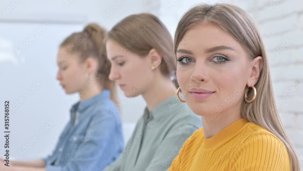 Portrait of Young Creative Woman Looking at the Camera Portrait of Young Creative Woman Looking at the Camera