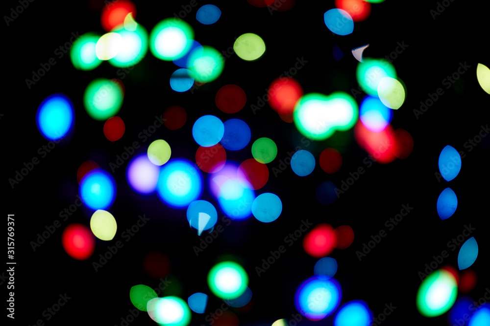 Red and orange, green, blue holliday bokeh. Abstract background Red and orange, green, blue holliday bokeh. Abstract background