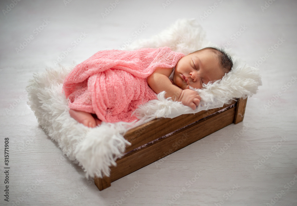 Obraz premium Top view image of a newborn baby sleeping