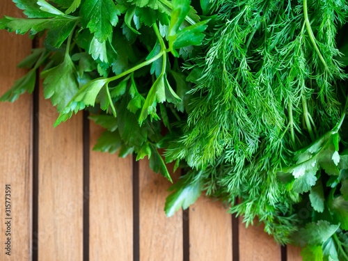 fresh herbs on a wooden background 