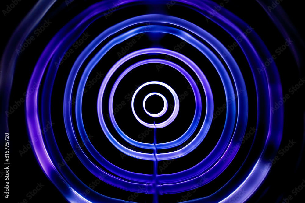 Fototapeta premium Sound waves in the dark in violet color