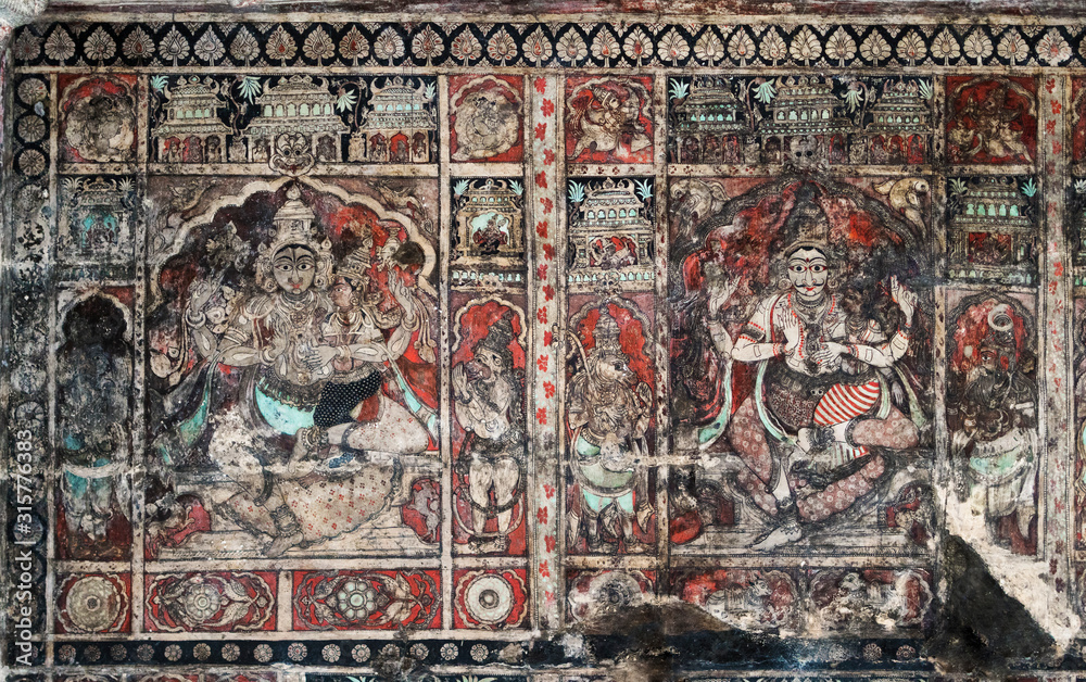 Colored ancient frescos the describing historical events, on a ceiling in the temple complex of Virupaksha in Hampi.