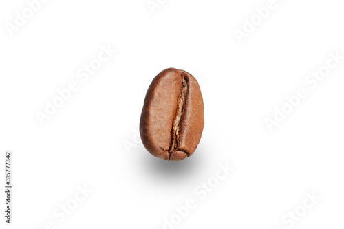  roasted coffee grain on a white plate close-up