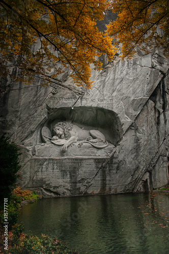 Löwendenkmal, Lucerne, Switzerland. The Lion Monument, an impressive memorial in homage to the Swiss guard, who protected the French king Louis XVI from the revolutionaries, on August 10, 1792.