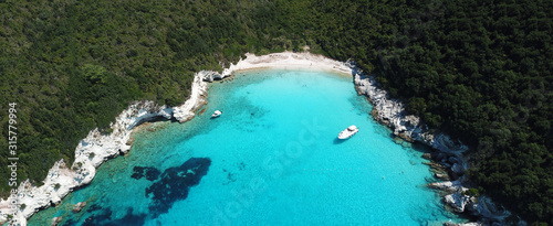 Aerial drone ultra wide photo of paradise tropical exotic white rocky deep turquoise seascape forming a blue lagoon in Caribbean popular destination