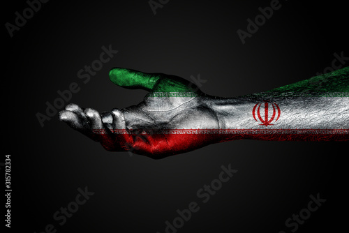 An outstretched hand with a painted Iran flag, a sign of help or a request, support or poverty, on a dark background