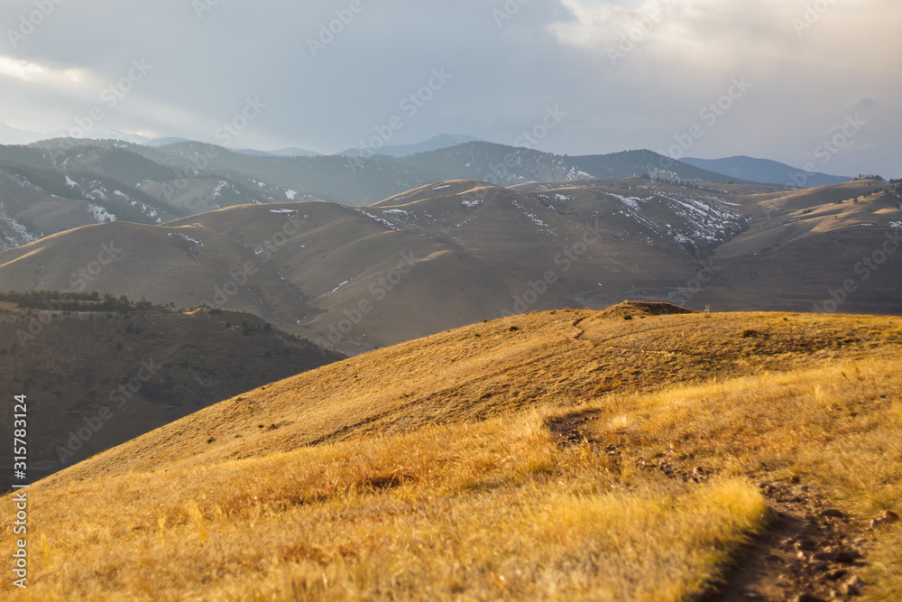 Fototapeta premium Winding Road in the Rolling Hills and Mountains