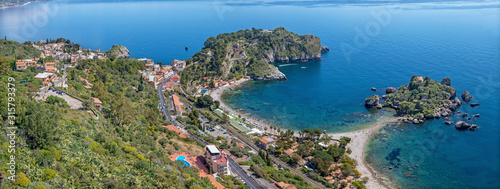 Fototapeta Naklejka Na Ścianę i Meble -  Taormina - The sicilian coastline with the beautifull little island Isola Bella.