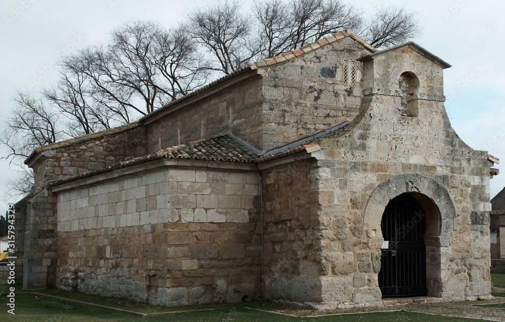 Fototapeta premium The Church of San Juan Bautista is the first Visigothic monument located in the town of Baños de Cerrato , Palencia Spain a place that was Roman villas