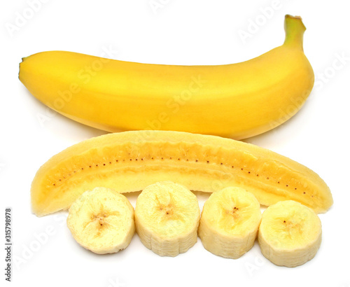 Banana whole, slice and half isolated on white background. Perfectly retouched, full depth of field on the photo. Top view, flat lay