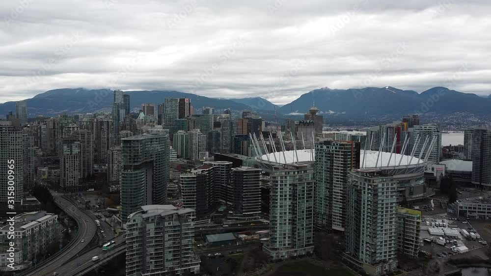 Aerial view of Vancouver downtown in the overcast day Aerial view of Vancouver downtown in the overcast day
