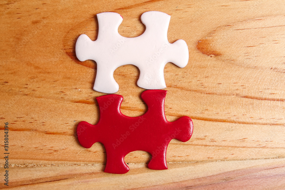 Missing jigsaw puzzle on wooden table. Copy Space Missing jigsaw puzzle on wooden table. Copy Space