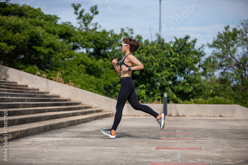 Asian women Running and jogging during outdoor on city run