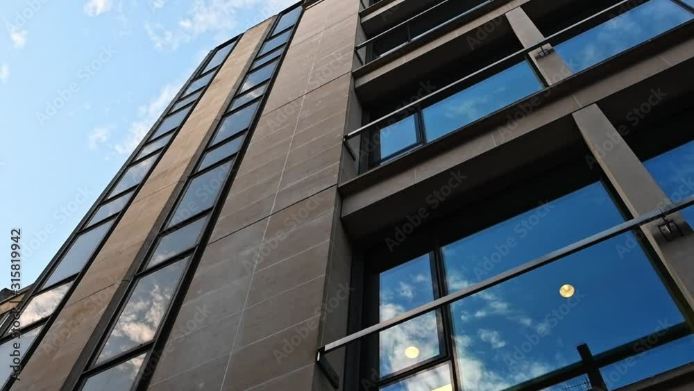 A time-lapse of clouds rolling by a London building A time-lapse of clouds rolling by a London building