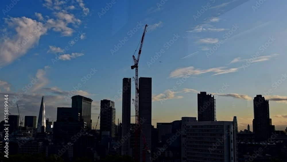 A London skyline time-lapse in silhouette with blue sky A London skyline time-lapse in silhouette with blue sky