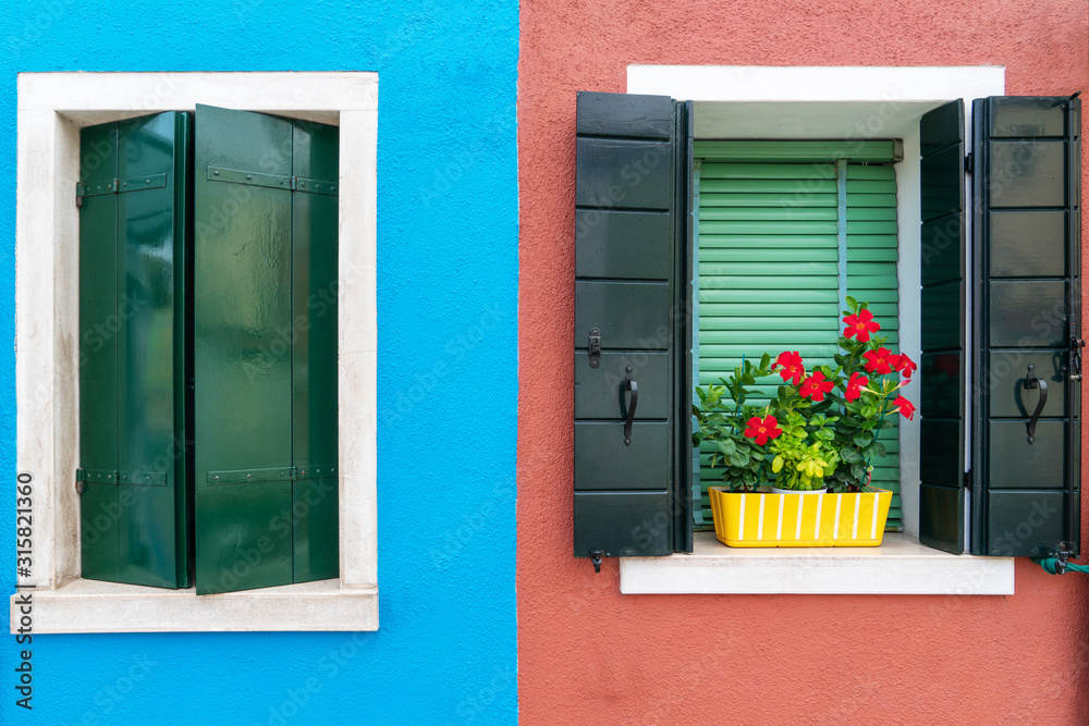 Fototapeta premium vintage wooden window on colorful cement background