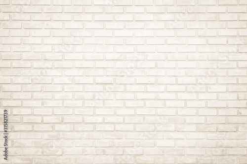 Background of wide cream brick wall texture. Old brown brick wall concrete or stone wall textured  wallpaper limestone abstract flooring Grid uneven interior rock. Home or office design backdrop.