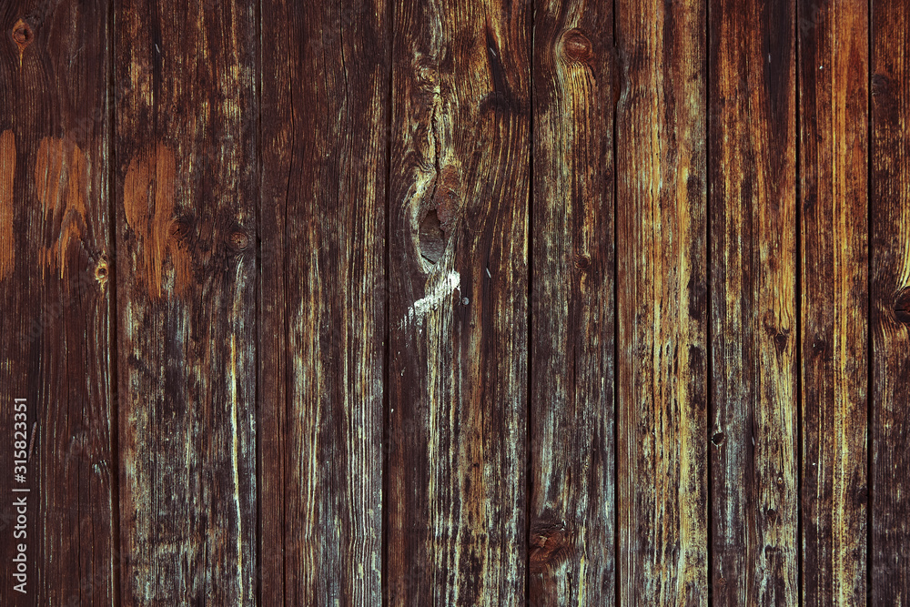 Old wooden boards with peeling paint. Testura from old boards with blue and red paint. Copy space, wooden background Old wooden boards with peeling paint. Testura from old boards with blue and red paint. Copy space, wooden background
