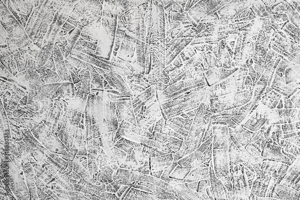 Gray grooved stucco on wall. Plaster patterned texture or background. Closeup Gray grooved stucco on wall. Plaster patterned texture or background. Closeup