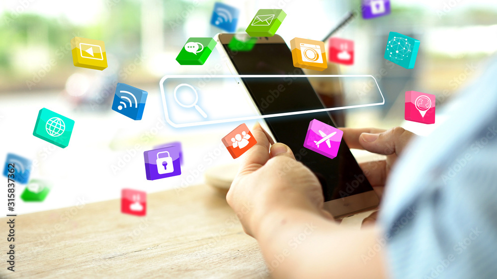 Hand using smartphone with Searching bar on screen. Data Networking Concept Hand using smartphone with Searching bar on screen. Data Networking Concept