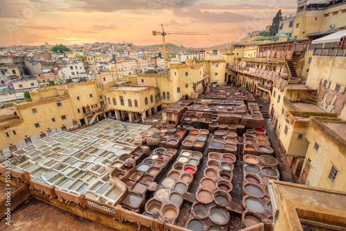 Fototapet Old tanks of the Fez's tanneries with color paint for leather