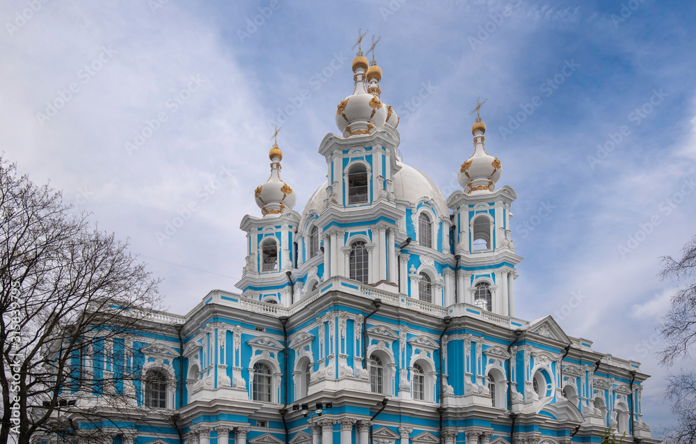 Fototapeta premium Smolny Convent of the Resurrection is located on square Rastrelli, on the bank of the River Neva in Saint Petersburg, Russia. Baroque style orthodox cathedral. Smolny Sobor or church.