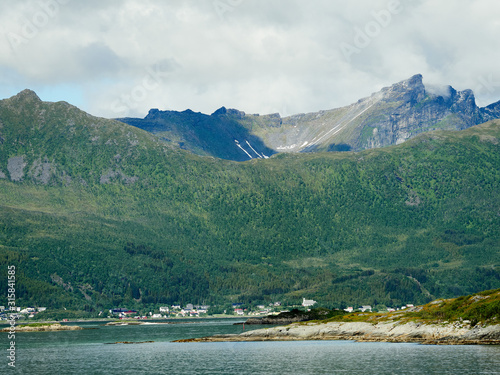 Scenic mountain view in mountainous summer terrain in northern Norway. Senja Island, Troms County - Norway. Beauty of nature concept background.