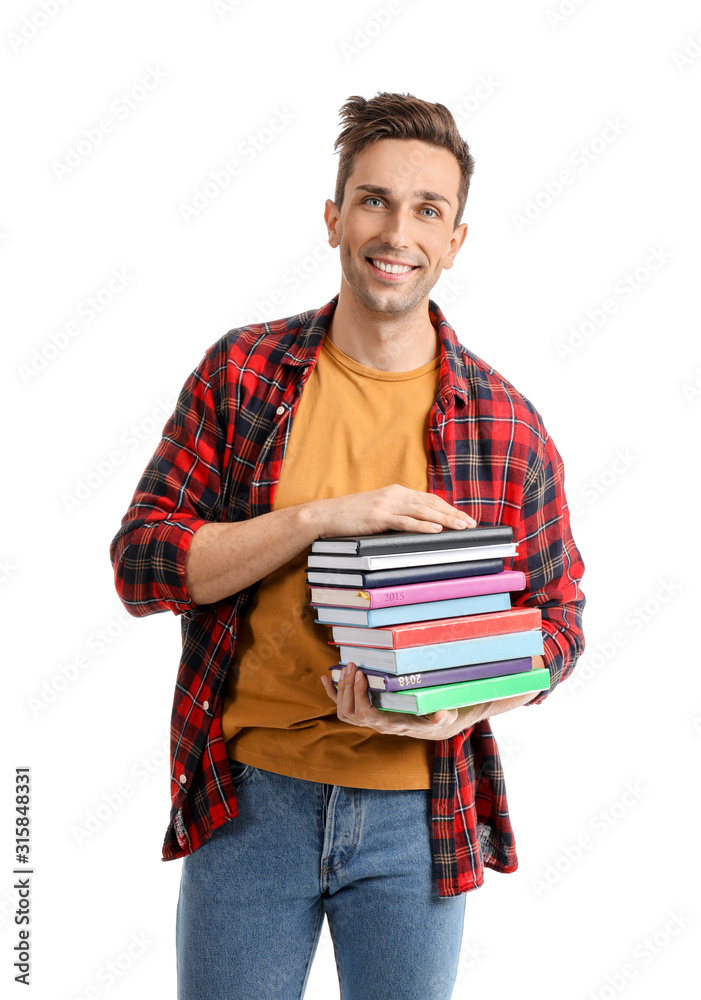 Handsome young man with books on white background Handsome young man with books on white background