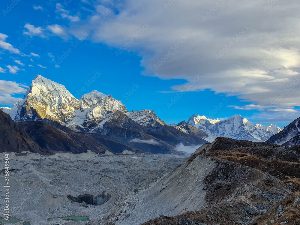 View on Ngozumpa glacier, the longest glacier in the Himalayas. Everest base camp trek itinerary: Gokyo village, Solokhumbu, Nepal.