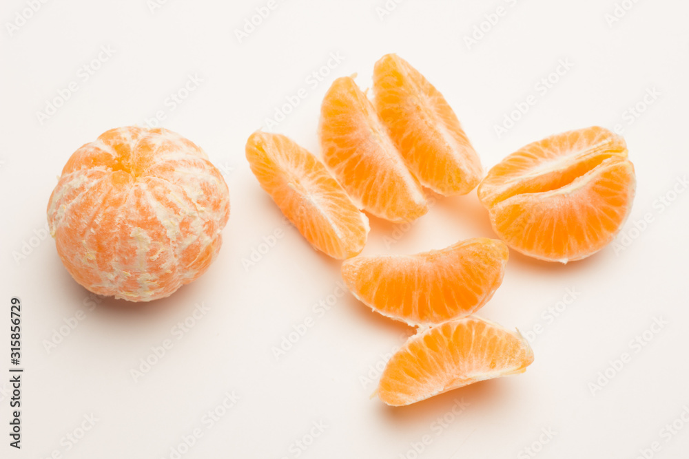 Tangerine orange-skinned sweet fruit of the citrus family. Tangerine orange-skinned sweet fruit of the citrus family.
