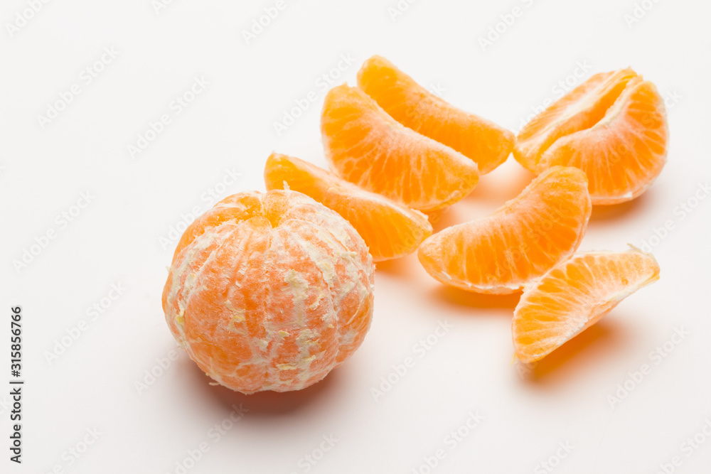 Tangerine orange-skinned sweet fruit of the citrus family. Tangerine orange-skinned sweet fruit of the citrus family.