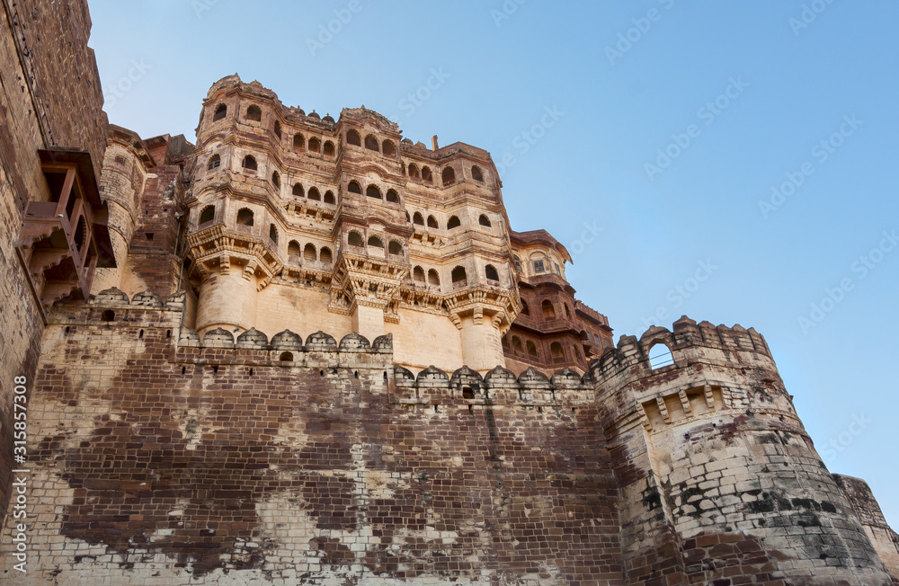 Fototapeta premium Mehrangarh Fort at Jodhpur Rajasthan at sunset with moody sky. A UNESCO World Heritage site.