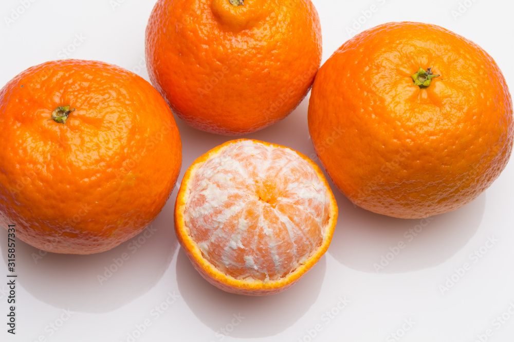 Tangerine orange-skinned sweet fruit of the citrus family. Tangerine orange-skinned sweet fruit of the citrus family.