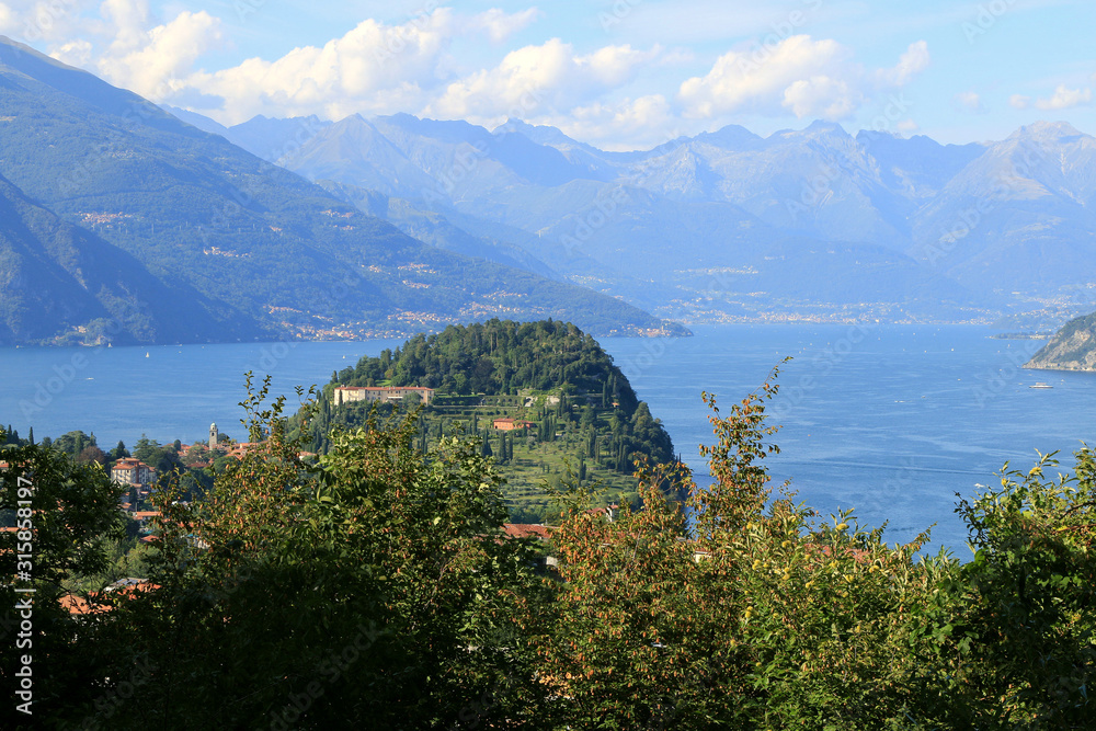 The Bellagio peninsula in the center of Como Lake seen from the hills behind the village.