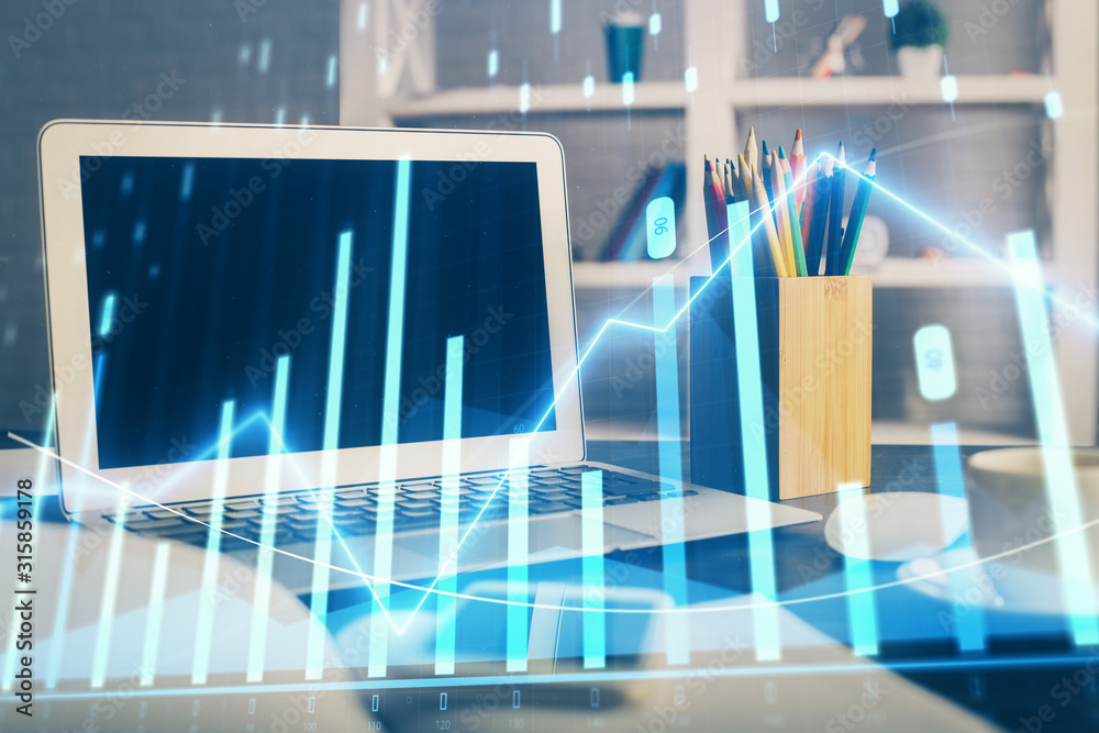 Stock market graph on background with desk and personal computer. Double exposure. Concept of financial analysis. Stock market graph on background with desk and personal computer. Double exposure. Concept of financial analysis.