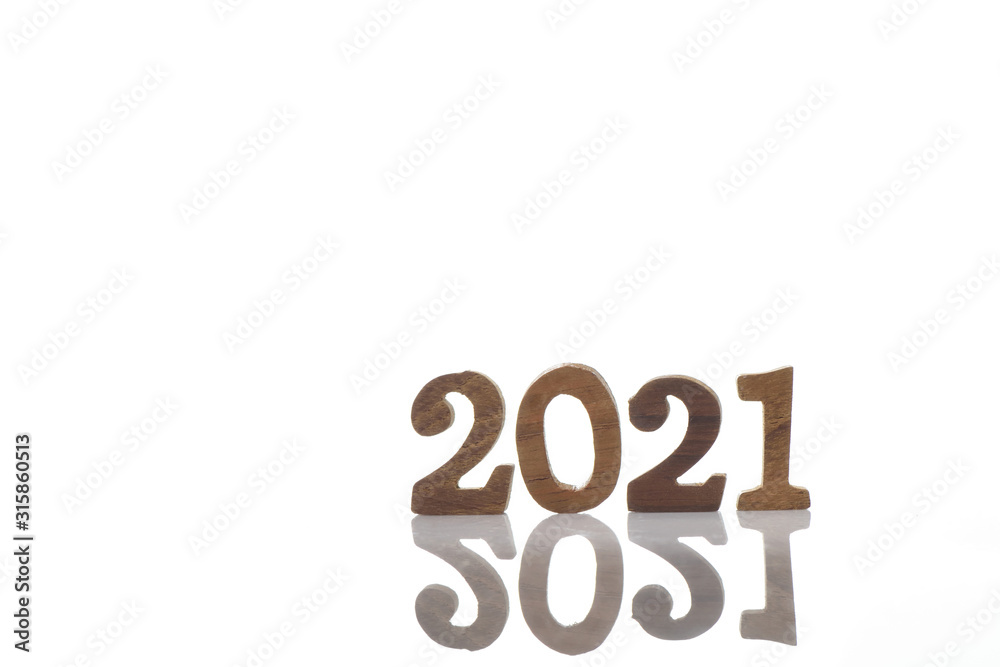 Wooden 2021 isolation on white background, happy new year concept and happiness time to change idea Wooden 2021 isolation on white background, happy new year concept and happiness time to change idea