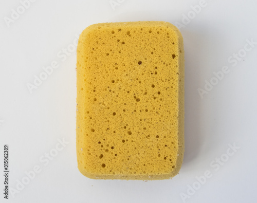 yellow sponge isolated on white background
