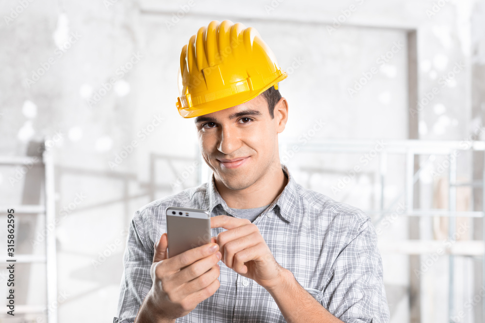 Smiling friendly architect, engineer or builder Smiling friendly architect, engineer or builder