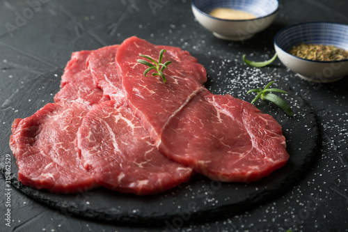 Fresh, thin beef steak with spices