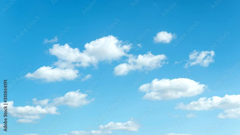Time-lapse clear blue sky with cloud scape, Cloud flying in blue sky, Multiple Exposure, 4K, Timelapse. Time-lapse clear blue sky with cloud scape, Cloud flying in blue sky, Multiple Exposure, 4K, Timelapse.
