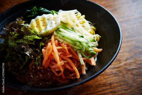 Korean mixed soba noodle with spicy sauce 