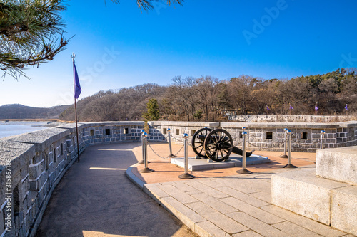 Cannon of the natural fortress Yongdudondae of Ganghwa Beach photo