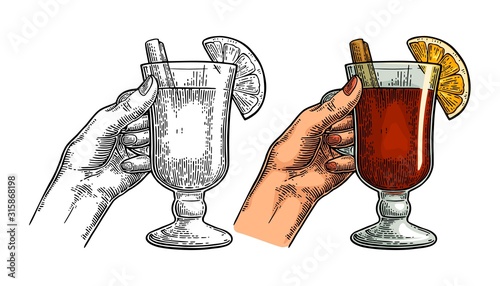 Female hand holding a glass of wine. Vintage vector engraving i