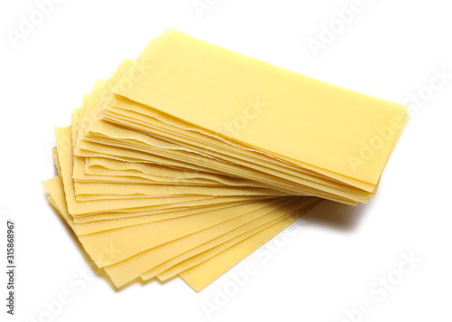 Uncooked Italian lasagna, pasta isolated on white background