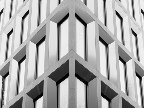 Black and white photo collage of bright modern building facade pictures. Abstract photo collage background.