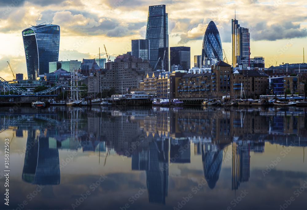 London cityscape during sunset with its reflection from river Thames
