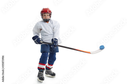 Little boy is hockey player.