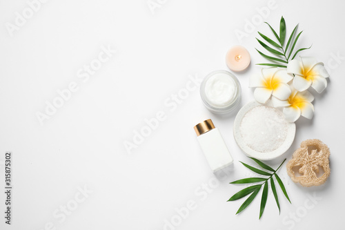 Composition with bath salt on white background, top view. Spa treatment
