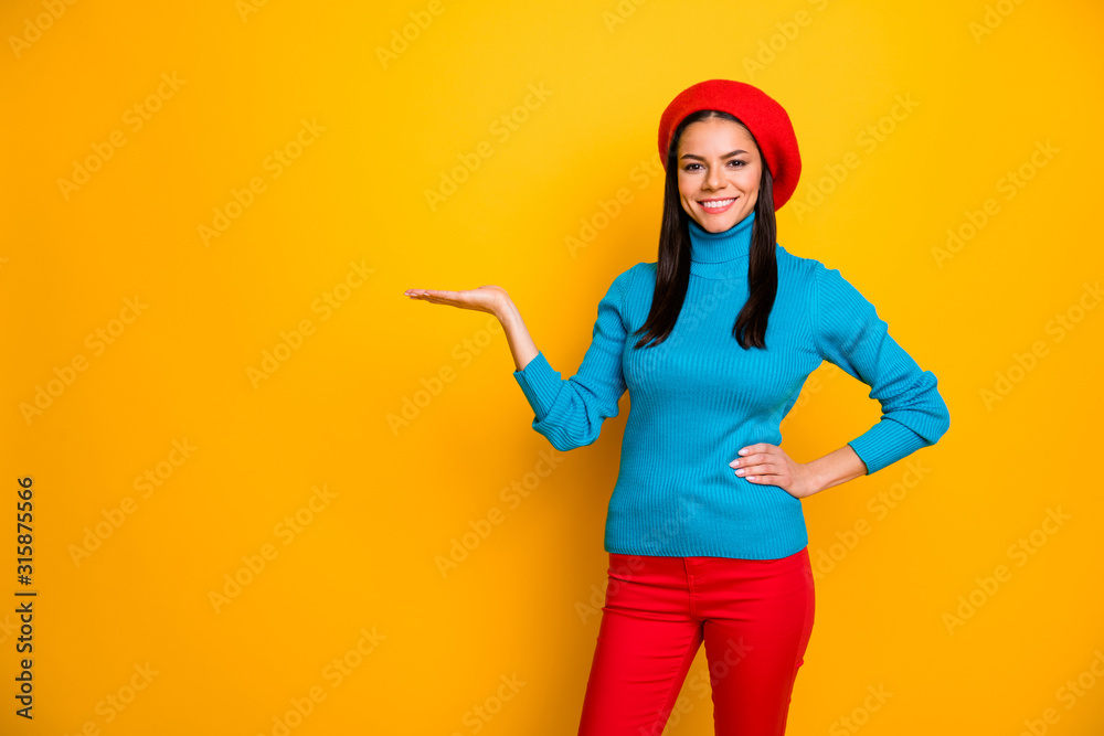 Portrait of her she nice attractive cute confident cheerful cheery girl holding on palm copy space advert good solution isolated over bright vivid shine vibrant yellow color background Portrait of her she nice attractive cute confident cheerful cheery girl holding on palm copy space advert good solution isolated over bright vivid shine vibrant yellow color background