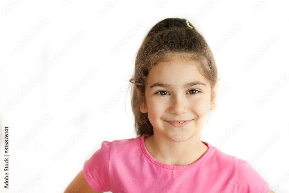 Portrait of happy smiling child girl isolated on white background. Laughing people. Positive emotions. Portrait of happy smiling child girl isolated on white background. Laughing people. Positive emotions.
